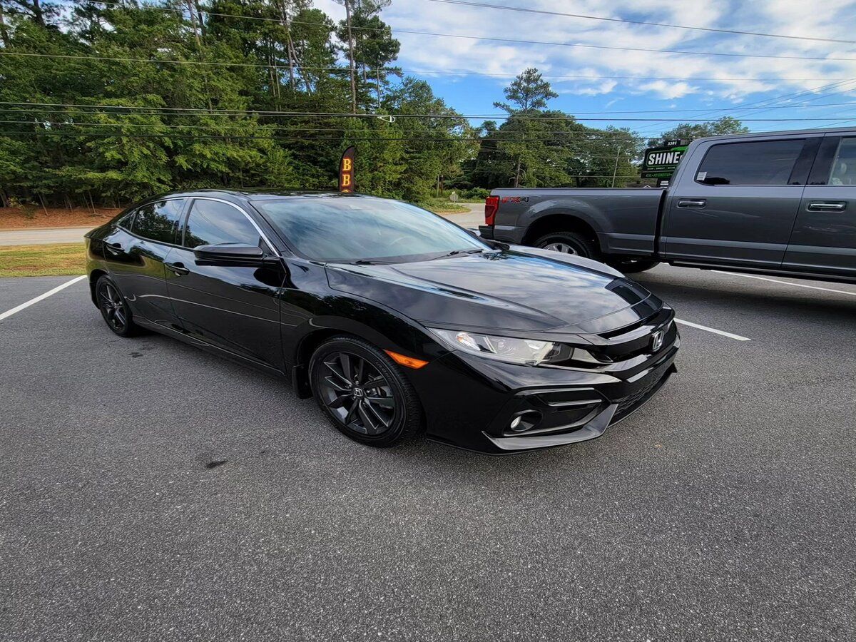 car ceramic coating in a black car.