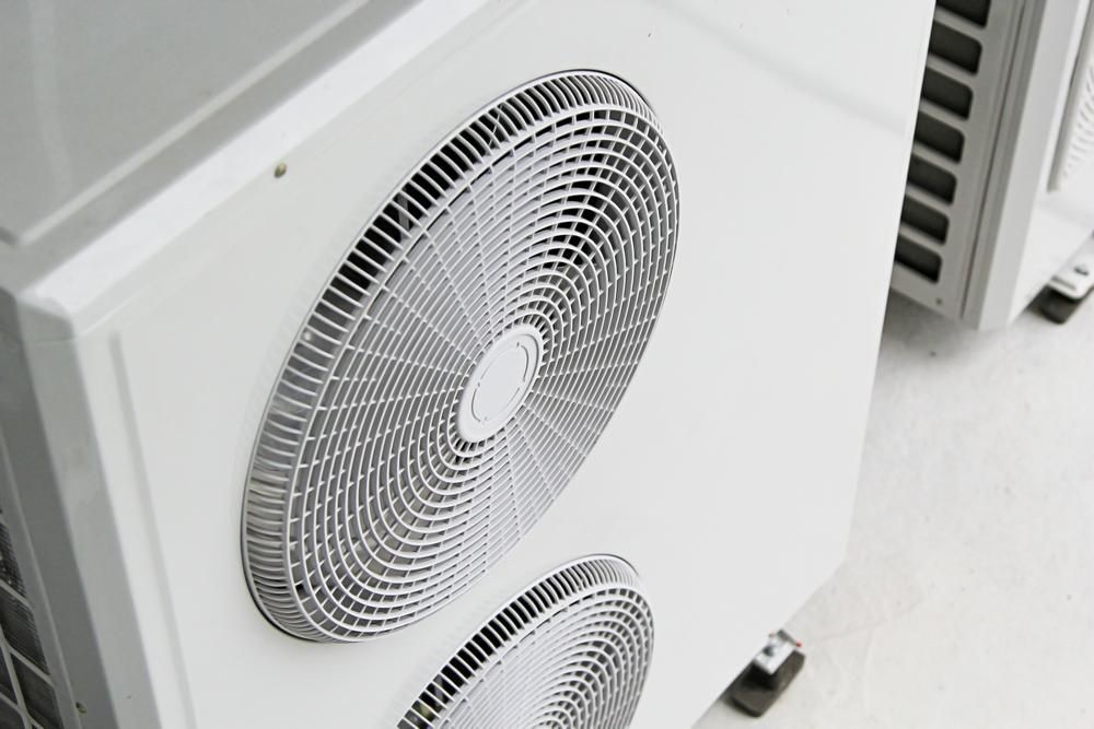 A Close up Of a Fan on The Side of A Building — JDG Refrigeration & Air in Goonellabah, NSW