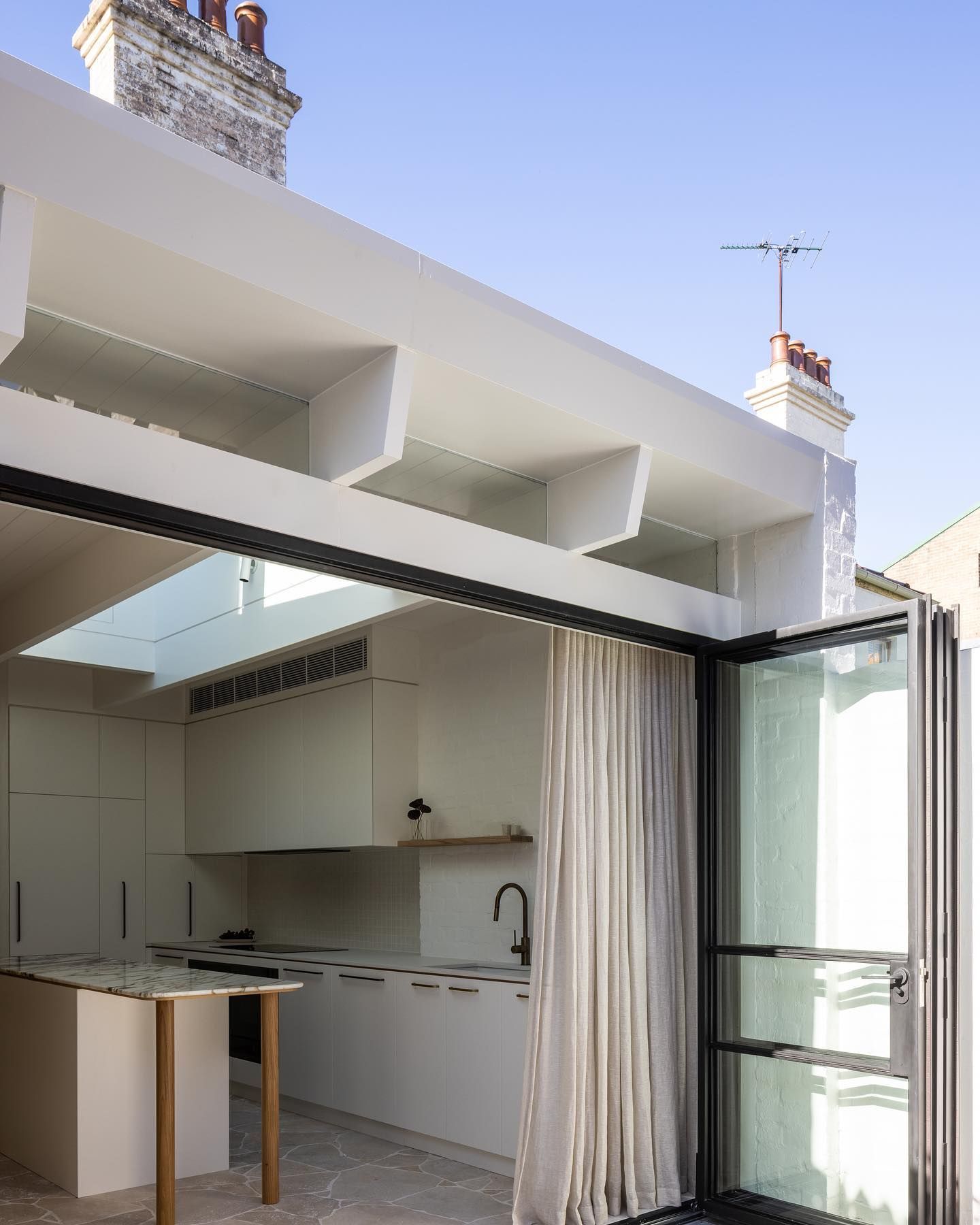 Kitchen with Sliding Doors to outdoors — BSpoke Cabinet Making & Joinery in Unanderra, NSW