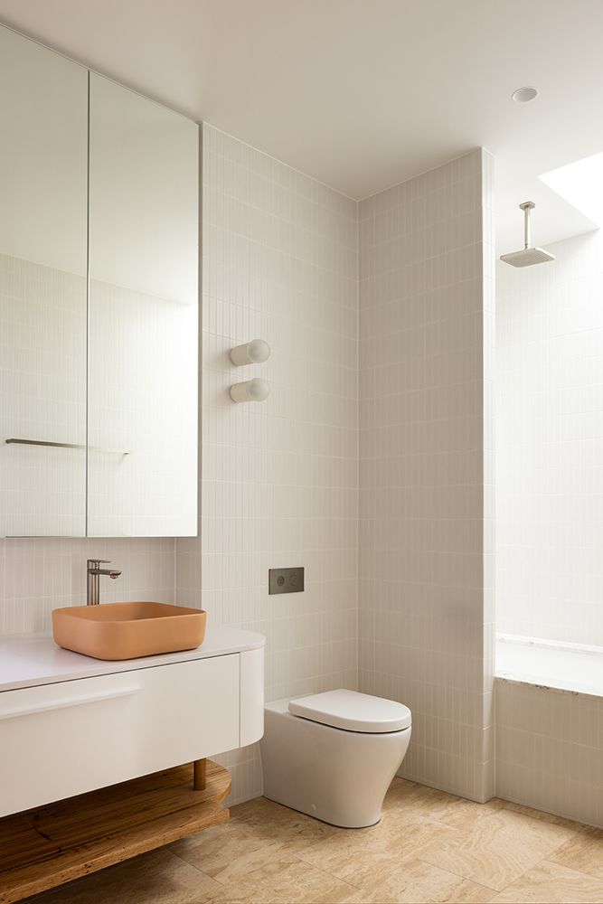Modern White Bathroom with a Wooden Vanity, Toilet, and Shower — BSpoke Cabinet Making & Joinery in Unanderra, NSW