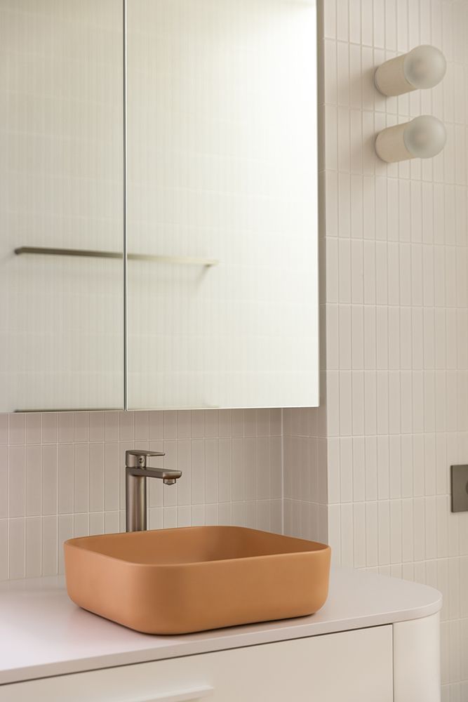 Modern Bathroom with an Orange Square Basin and White Cabinetry— BSpoke Cabinet Making & Joinery in Unanderra, NSW