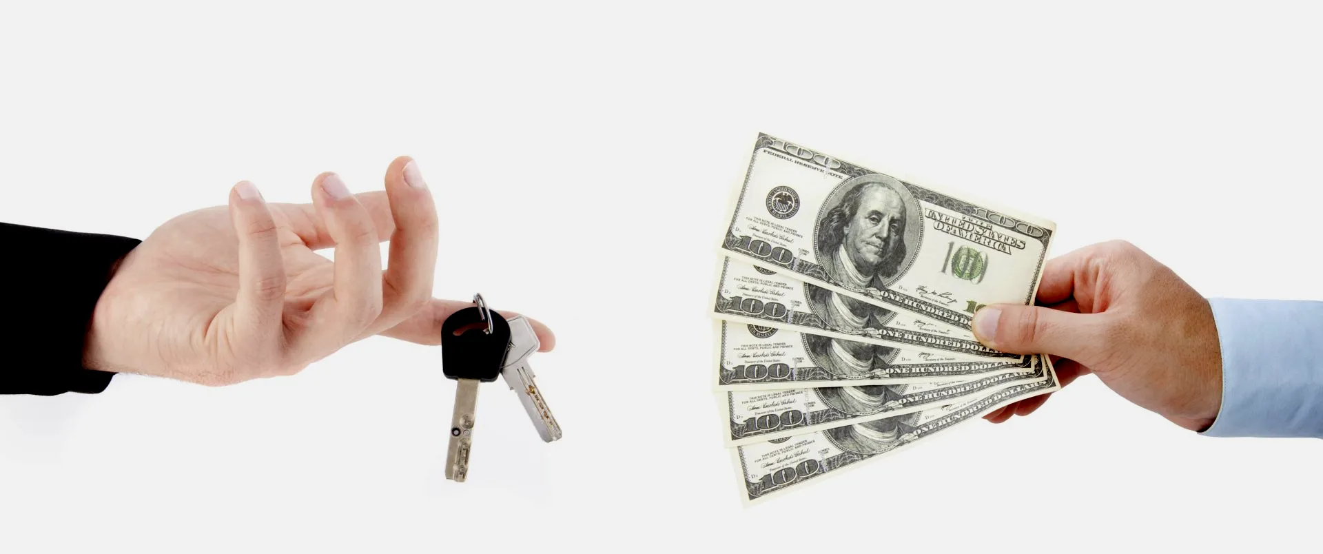 cash and car keys being exchanged