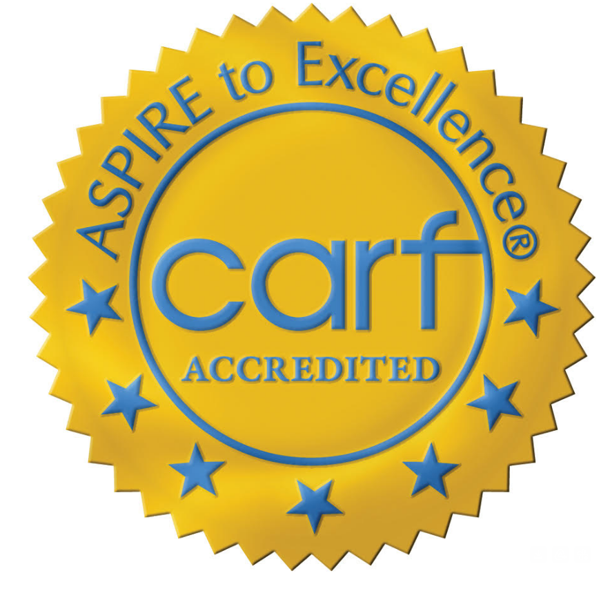 CARF Accredited seal; yellow and blue, with text 