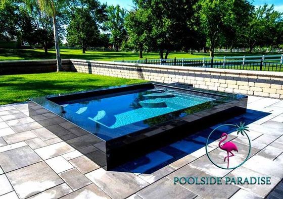 A pool with the words poolside paradise on the bottom