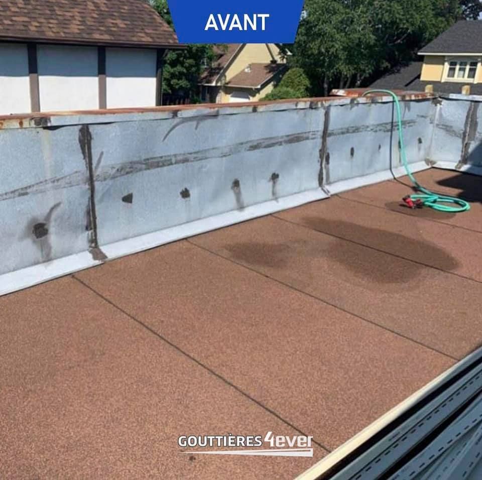 A picture of a roof before gouttieres 4ever