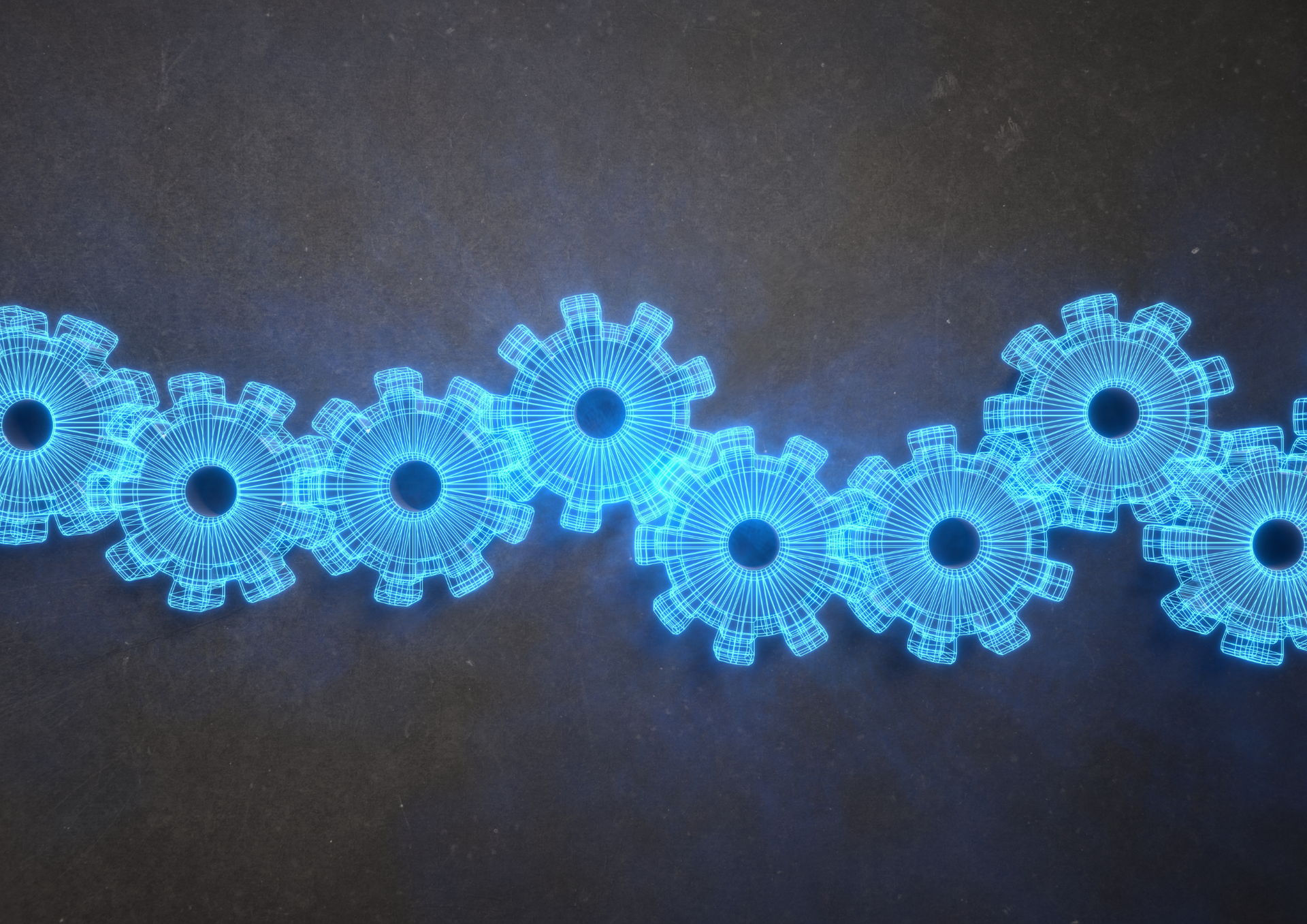 Blue glowing gears linked together on a dark background.