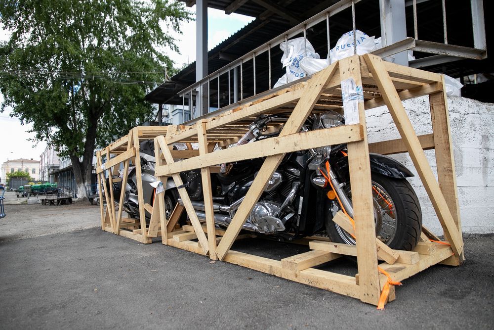 Motorcycle secured in wooden crate — Go With Joe REMOVALS in Zilzie, QLD