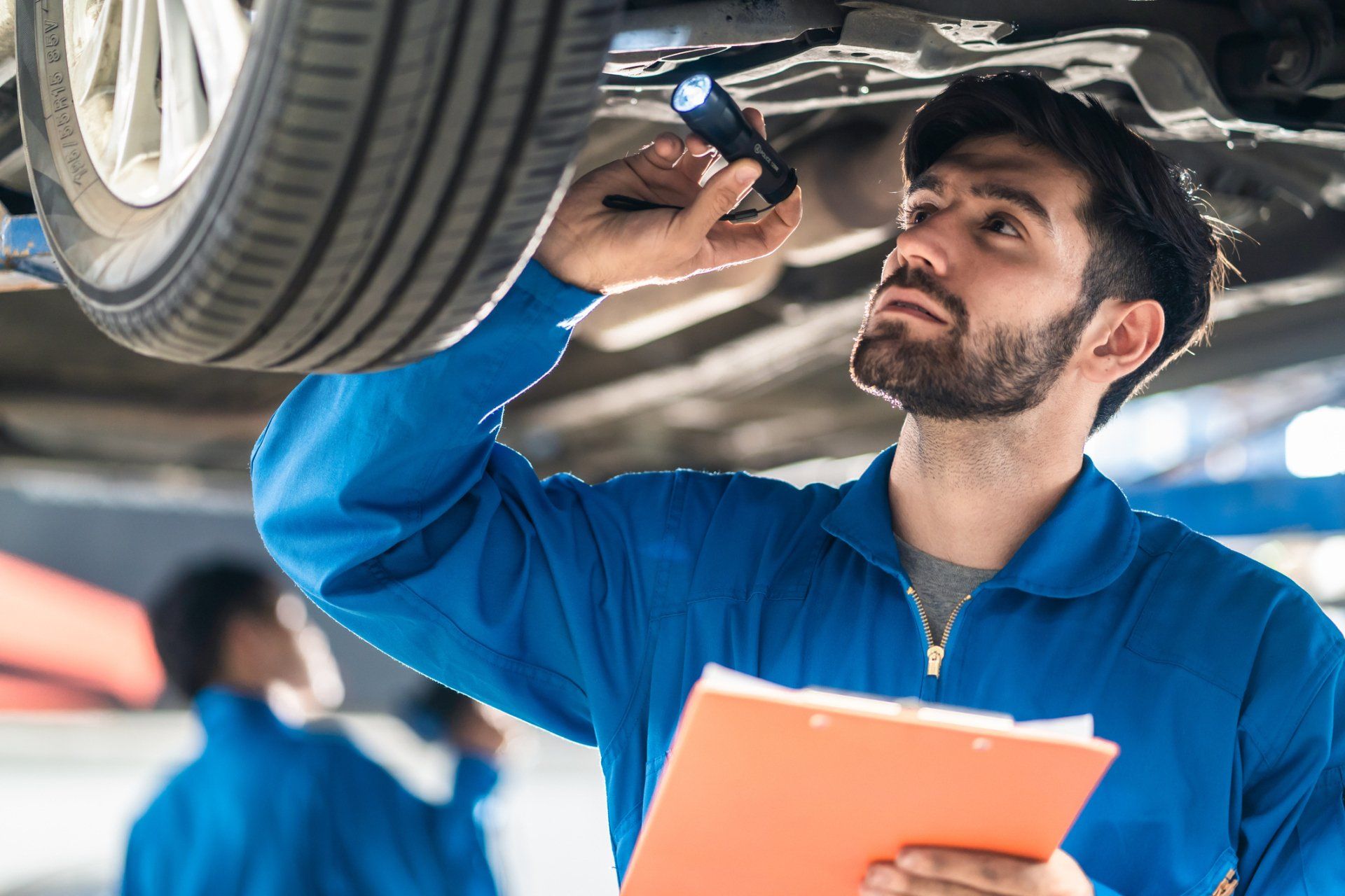 Technician Checking For Car Issues — Columbus, OH — Collision Solutions LLC