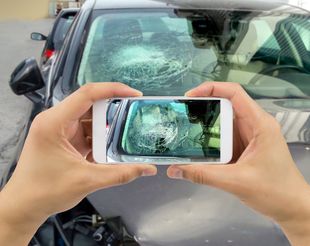 Taking Photo Windshield Cracked — Columbus, OH — Collision Solutions LLC