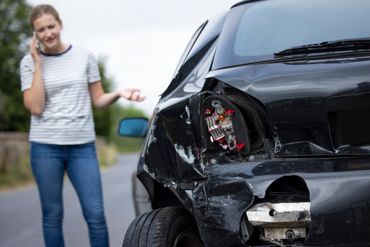 Girl Calling Car Repair Service — Columbus, OH — Collision Solutions LLC