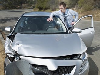 Man Problem On His Car — Columbus, OH — Collision Solutions LLC