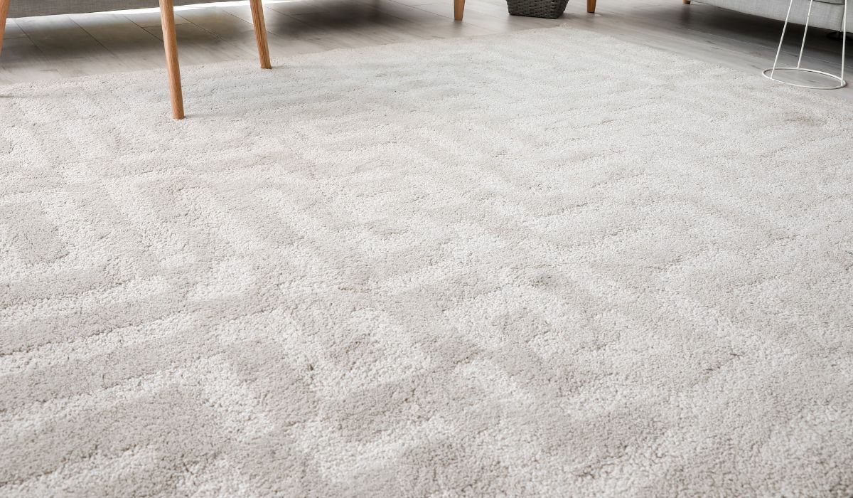 Eco Friend Carpet Clean - Light beige carpet with a geometric pattern.