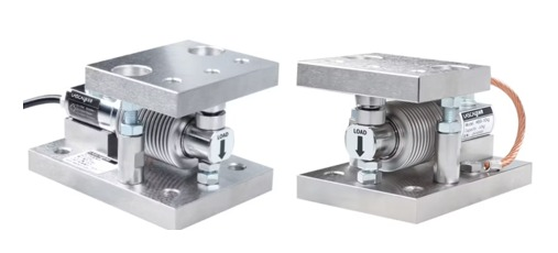 Dos celdas de carga plateadas, cada una con una placa de montaje superior e inferior y un sensor central, para medir el peso.
