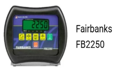 Indicador de peso digital Fairbanks FB2250 con pantalla verde que muestra 2250. Carcasa negra, botones amarillos y verdes.