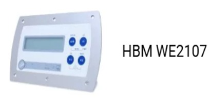 Panel de control HBM WE2107 con pantalla digital, botones azules y marco plateado.