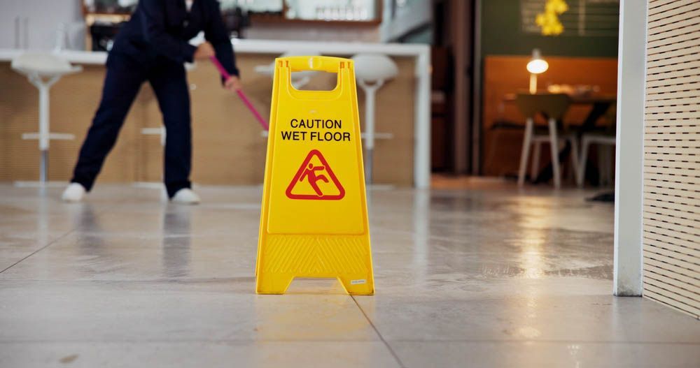 “WET FLOOR” sign