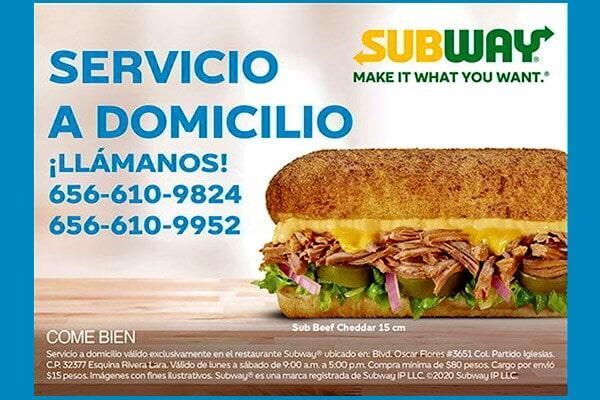 Un anuncio de metro muestra un sándwich sobre una mesa.