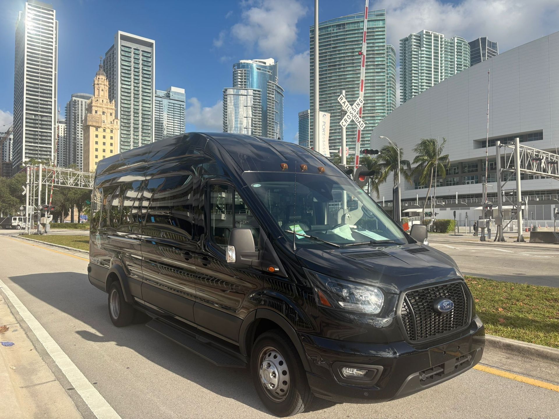 Black Miami Tour Bus Parked in Downtown Miami