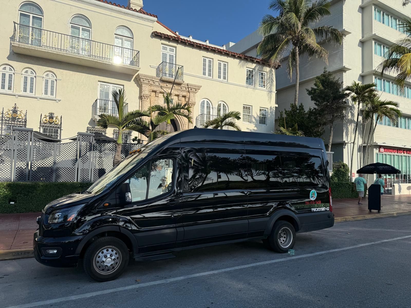 Miami Tour Bus parked in front of the Versace Mansion