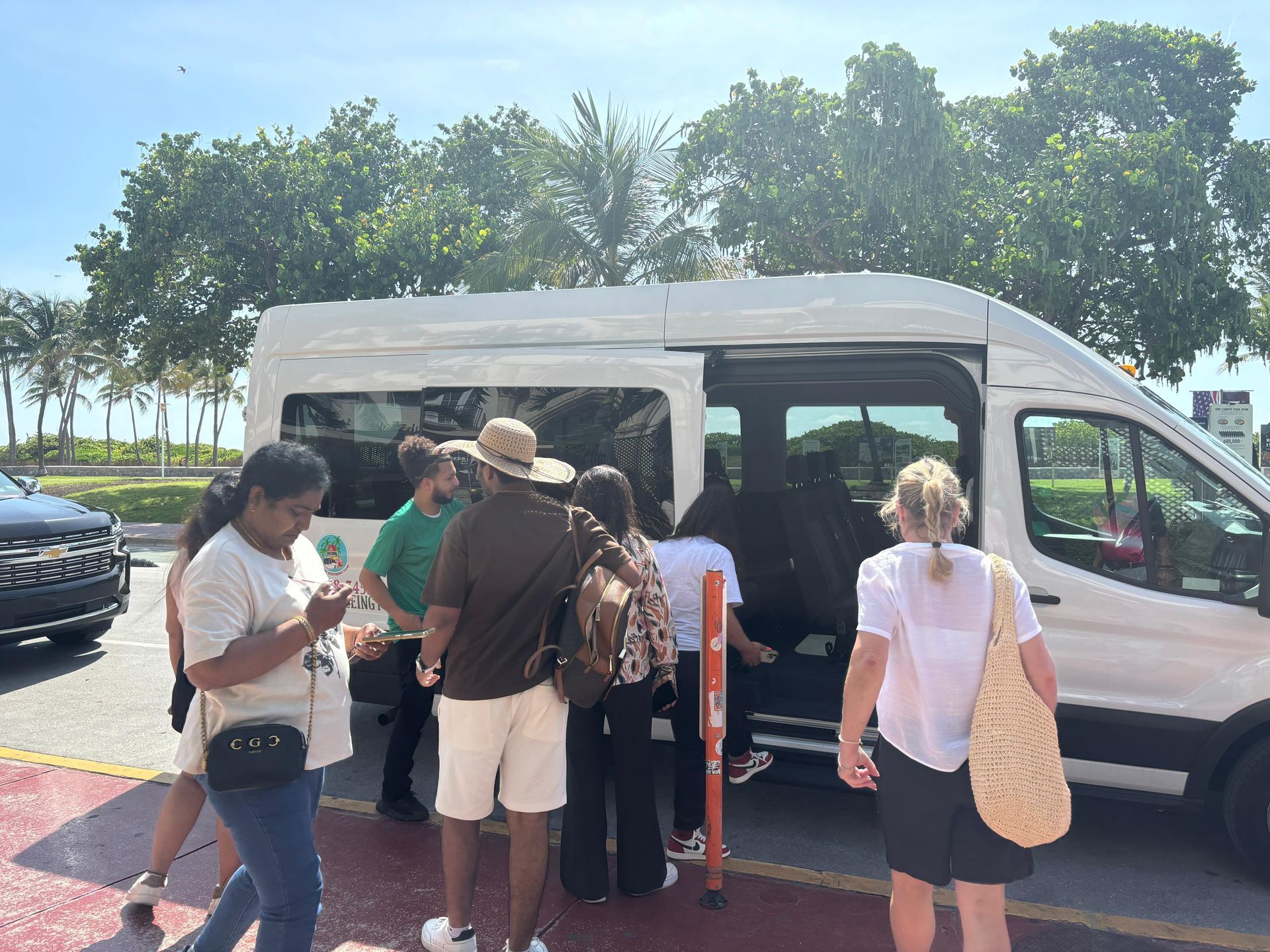 Guest boarding the Hop on Hop off Miami Combo Tour