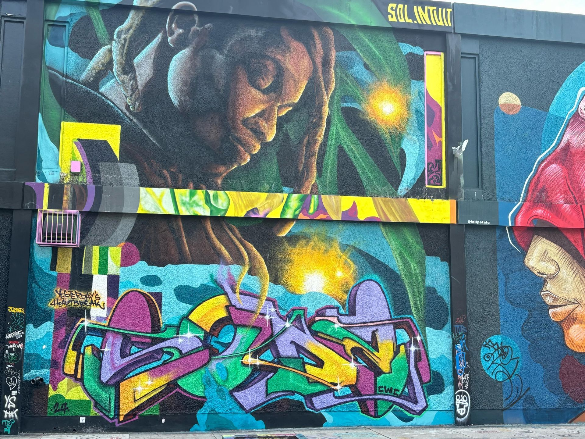 Colorful Mural at Wynwood Walls on the Best Miami City Bus Tour for families. 