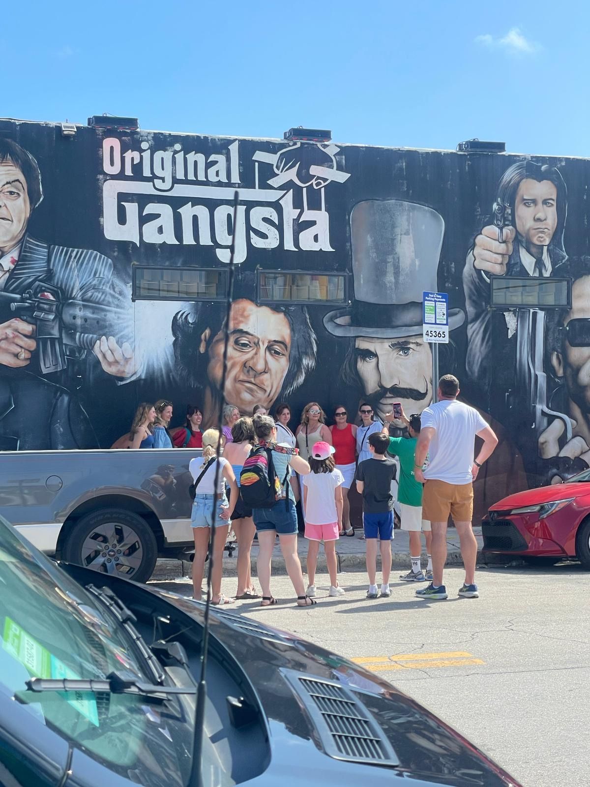 Family with kids at Wyndwood Walls gangster Walls taking photos

