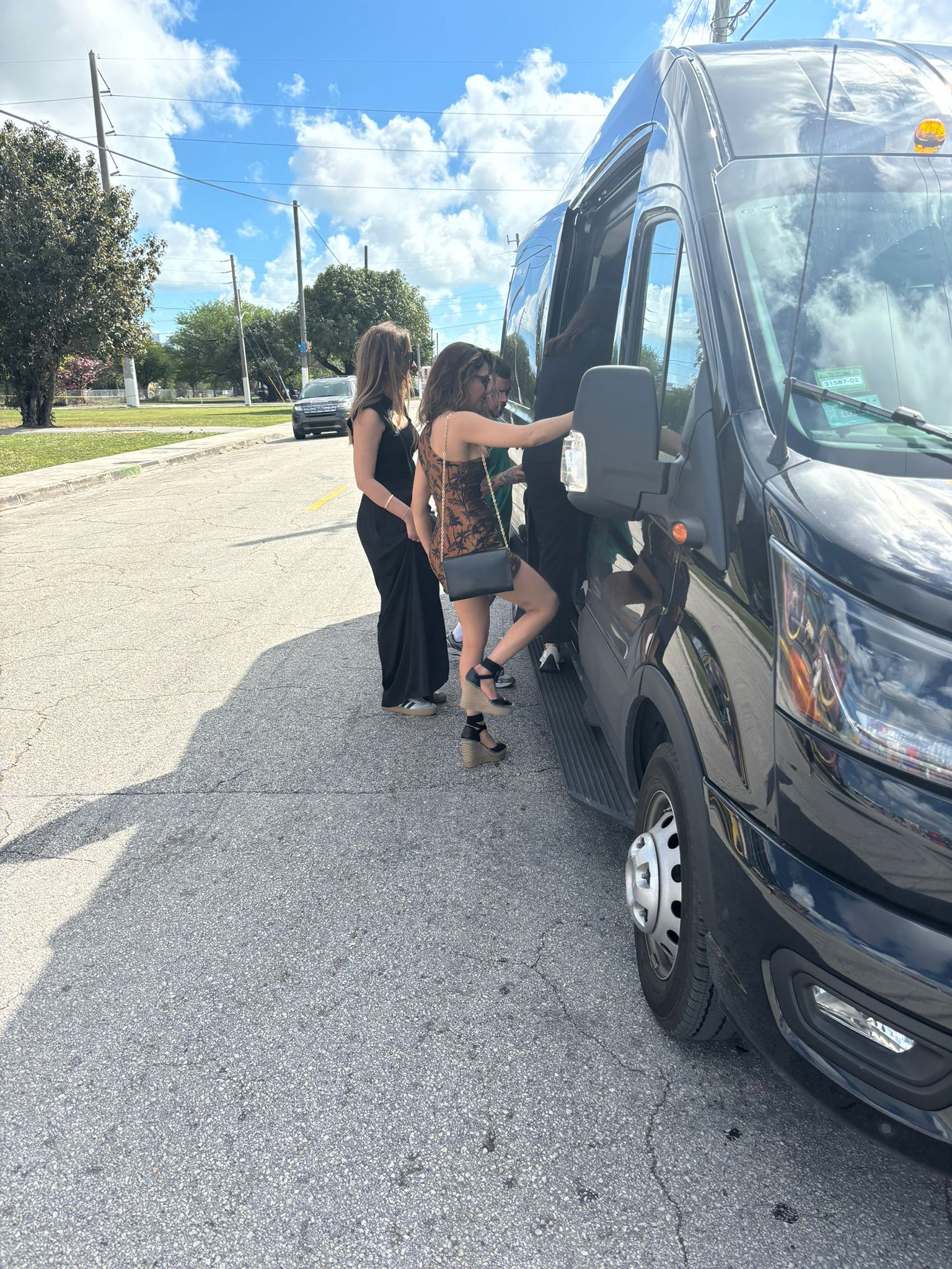 Small-group Miami hop on hop off tour boarding the Miami tour bus
