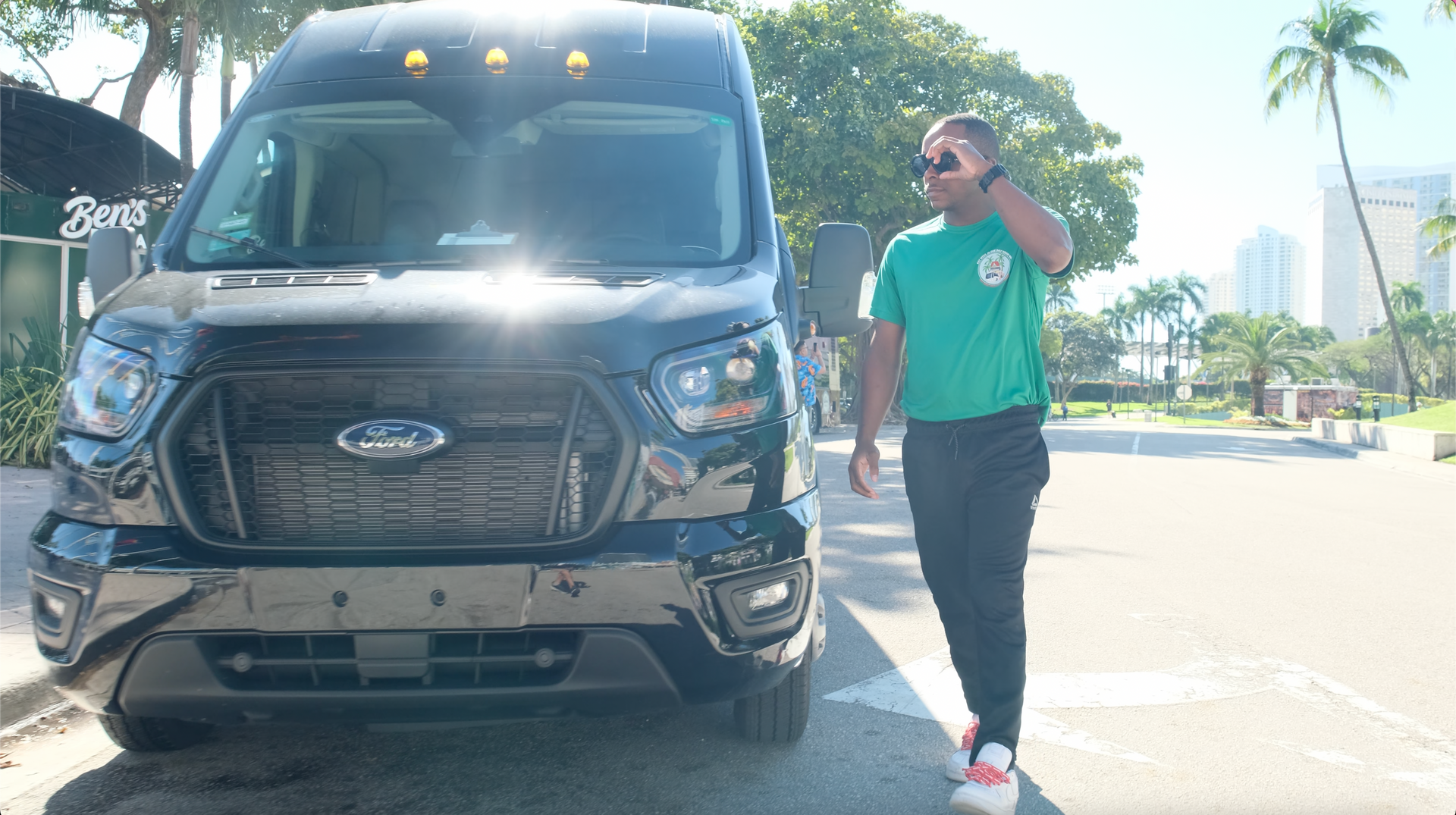 Bus Tours Miami – Tour Guide at Bayside Marketplace Welcoming Guests for Check-In
