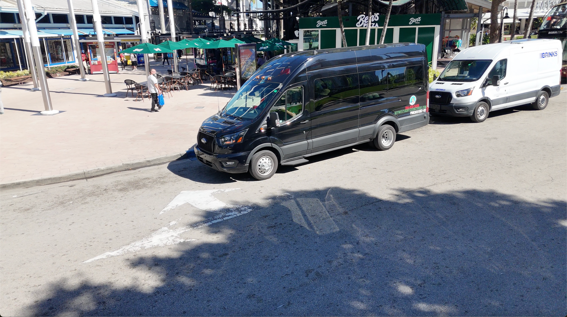 Black Bus from Miami Tour Bus parked in Bayside Marketplace,