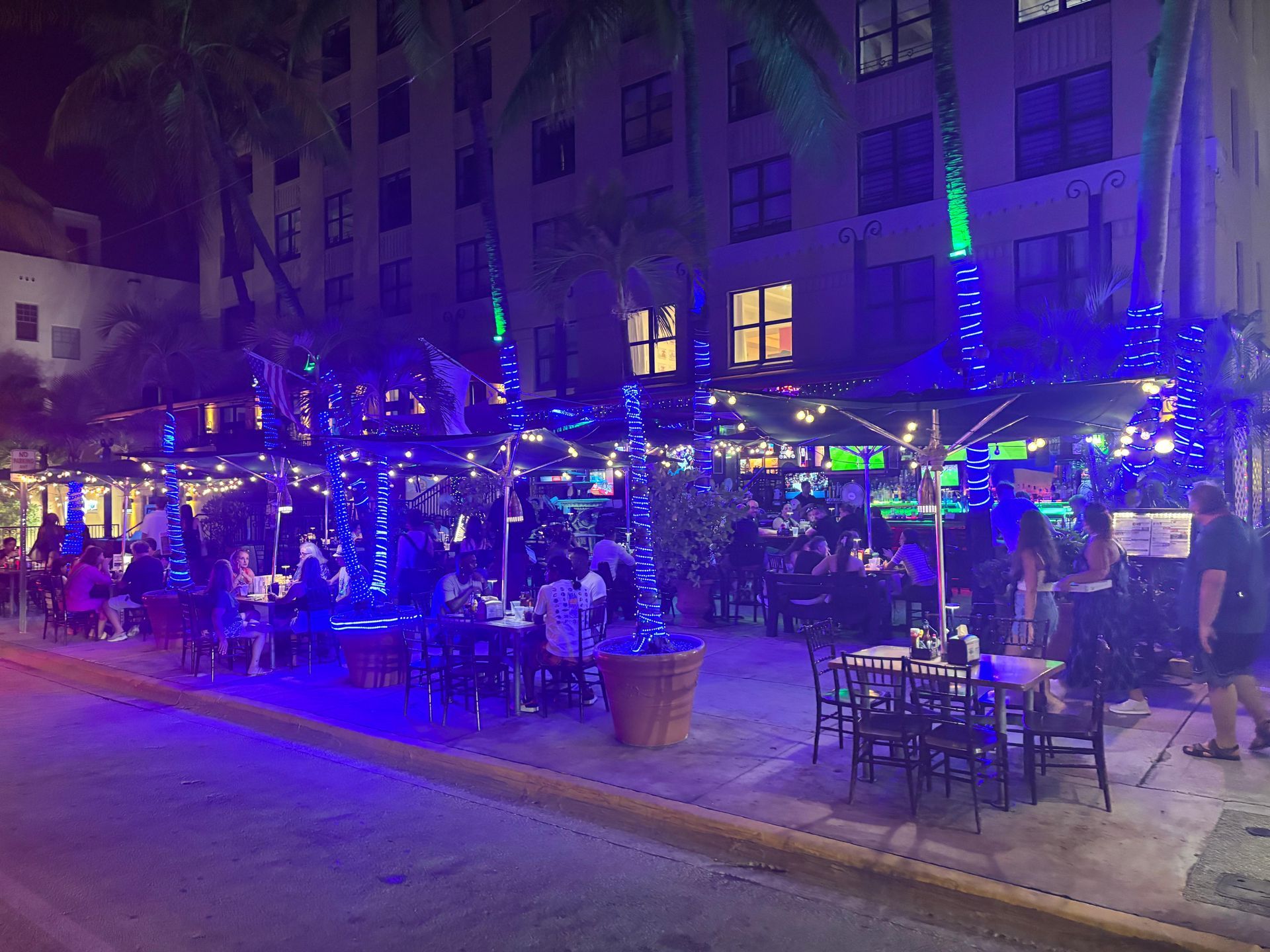 Ocean drive, lit up like Little Havana ln the Miami Night Tours