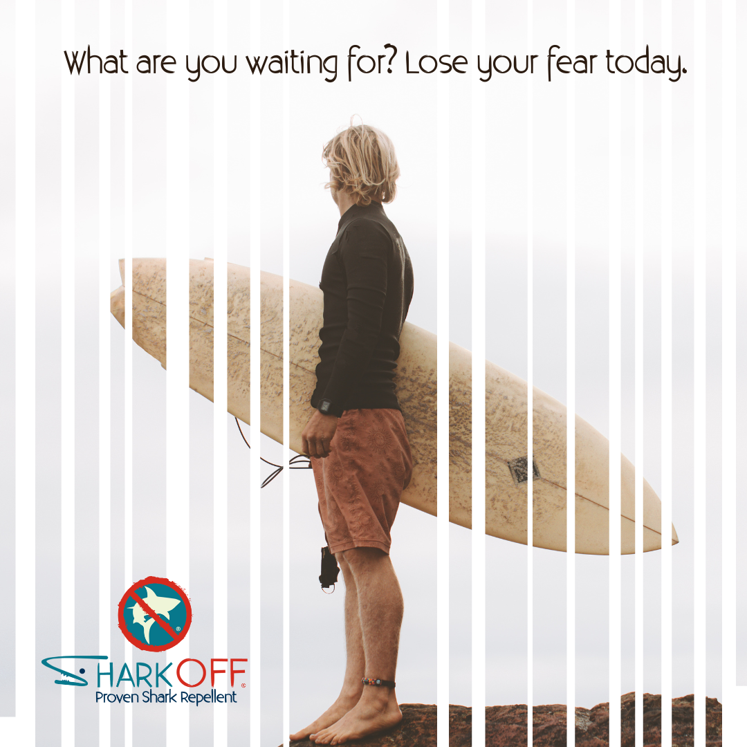 A man holding a surfboard with the words what are you waiting for lose your fear today