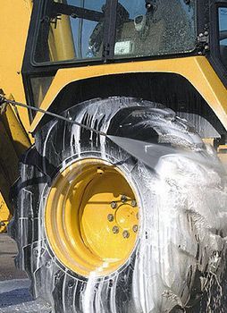 Power washing heavy equipment tire