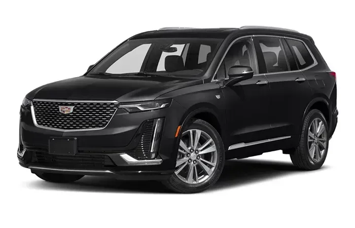 Black Cadillac XT6 SUV parked outdoors.