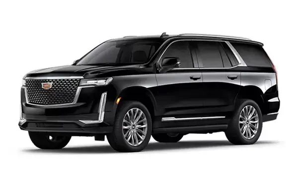 Black Cadillac Escalade SUV parked, silver accents, front view.