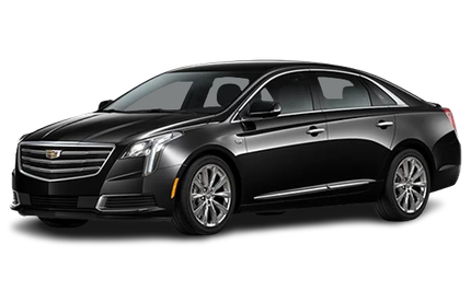 Black Cadillac sedan on a white background.