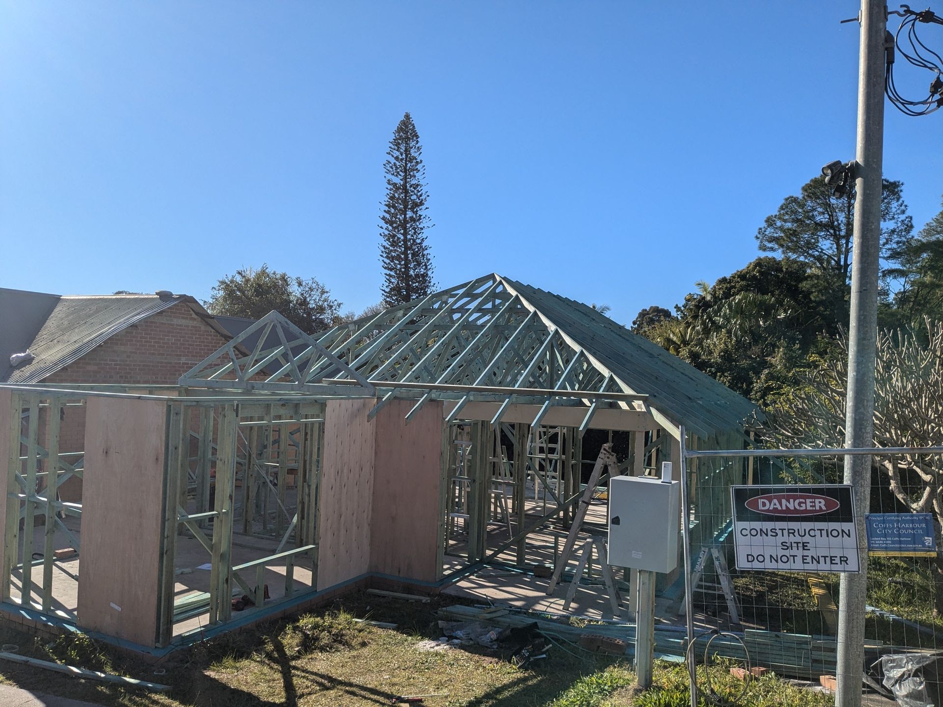 A room with a lot of windows and a view of the ocean — BK Build Group in Coffs Harbour, NSW