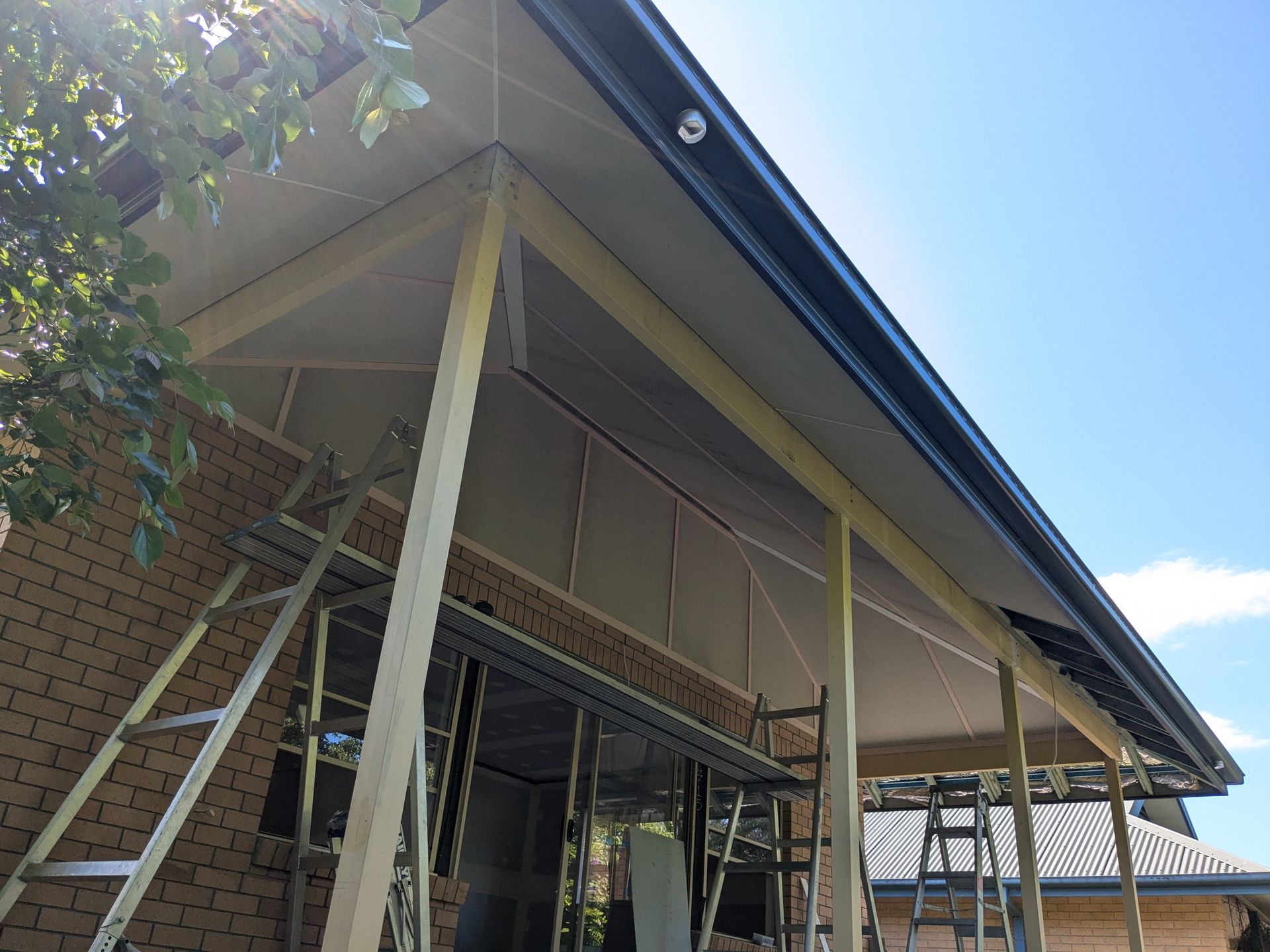 A Brick House With a Roof That is Being Built — BK Build Group in Coffs Harbour, NSW