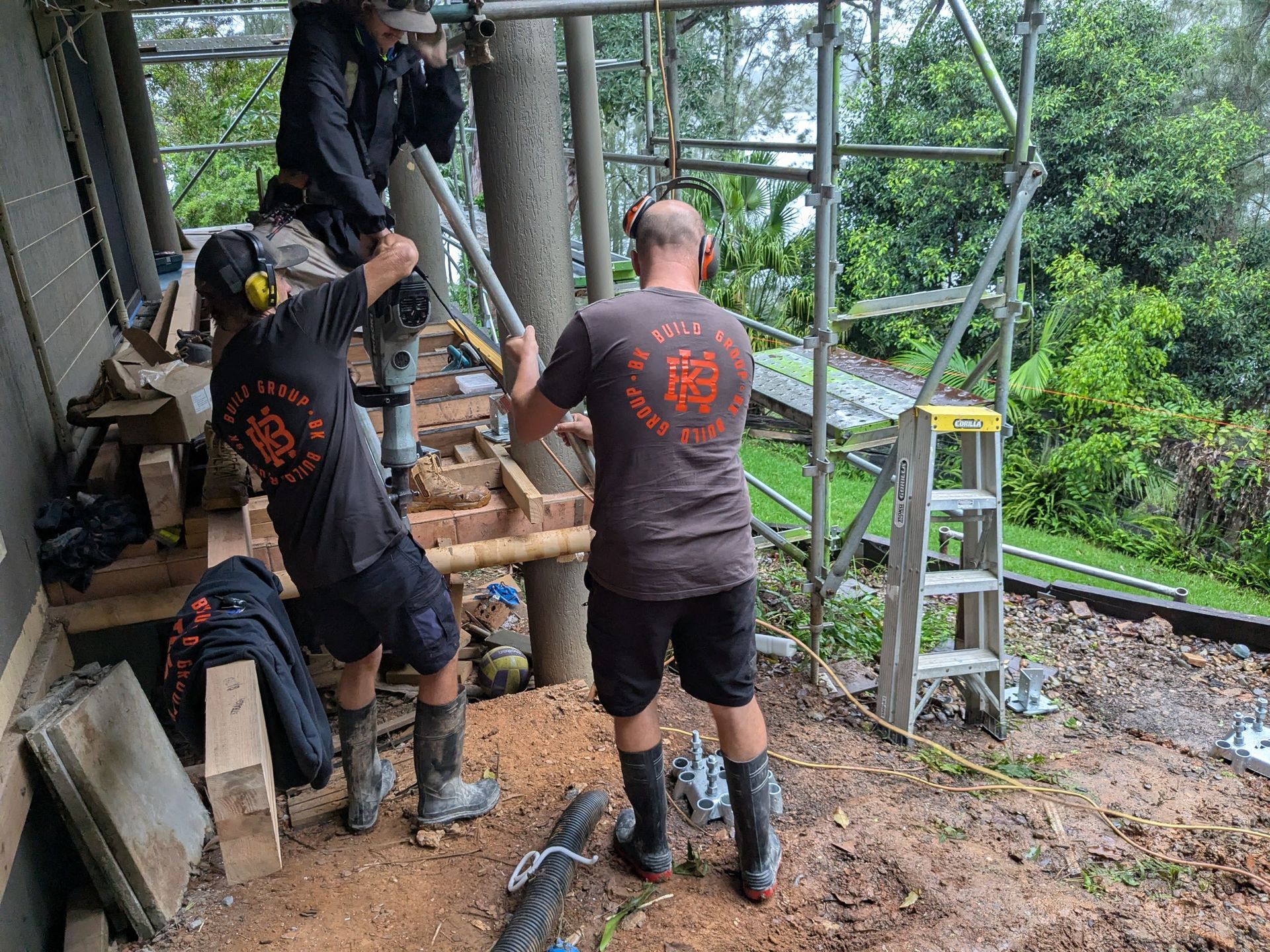 Men Setting Up Scaffolding— BK Build Group in Coffs Harbour, NSW