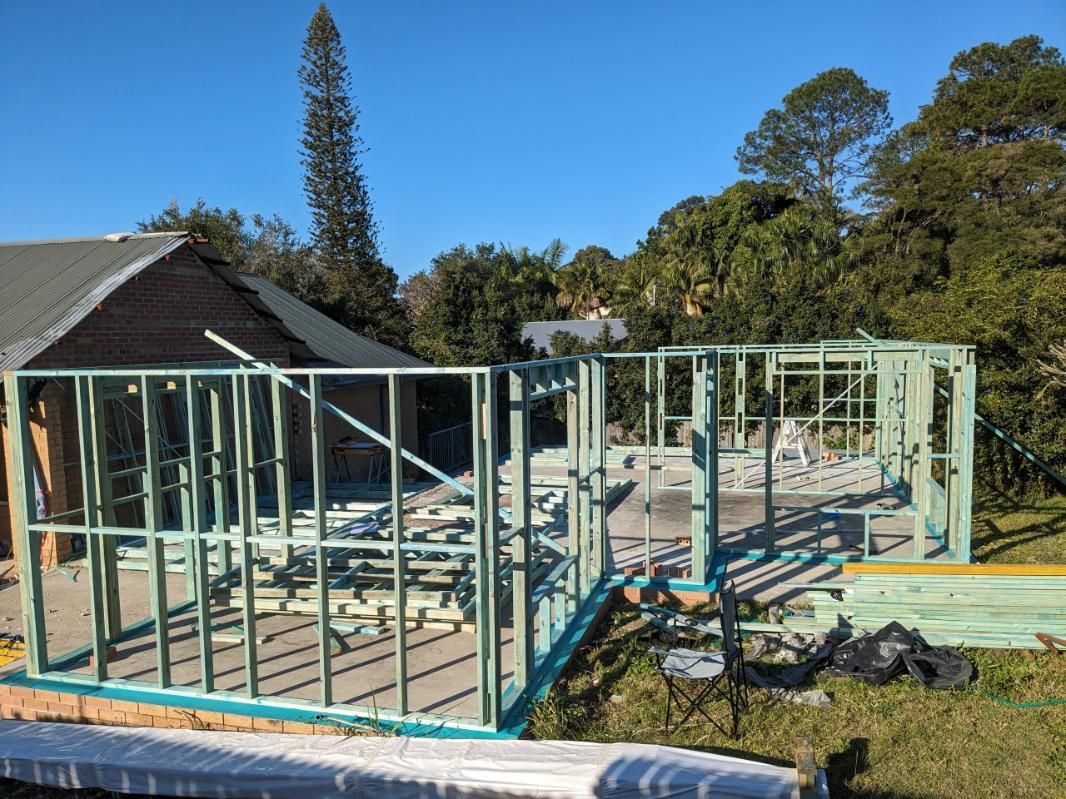 A House is Being Built With a Lot of Wooden Frames — BK Build Group in Bellingen, NSW