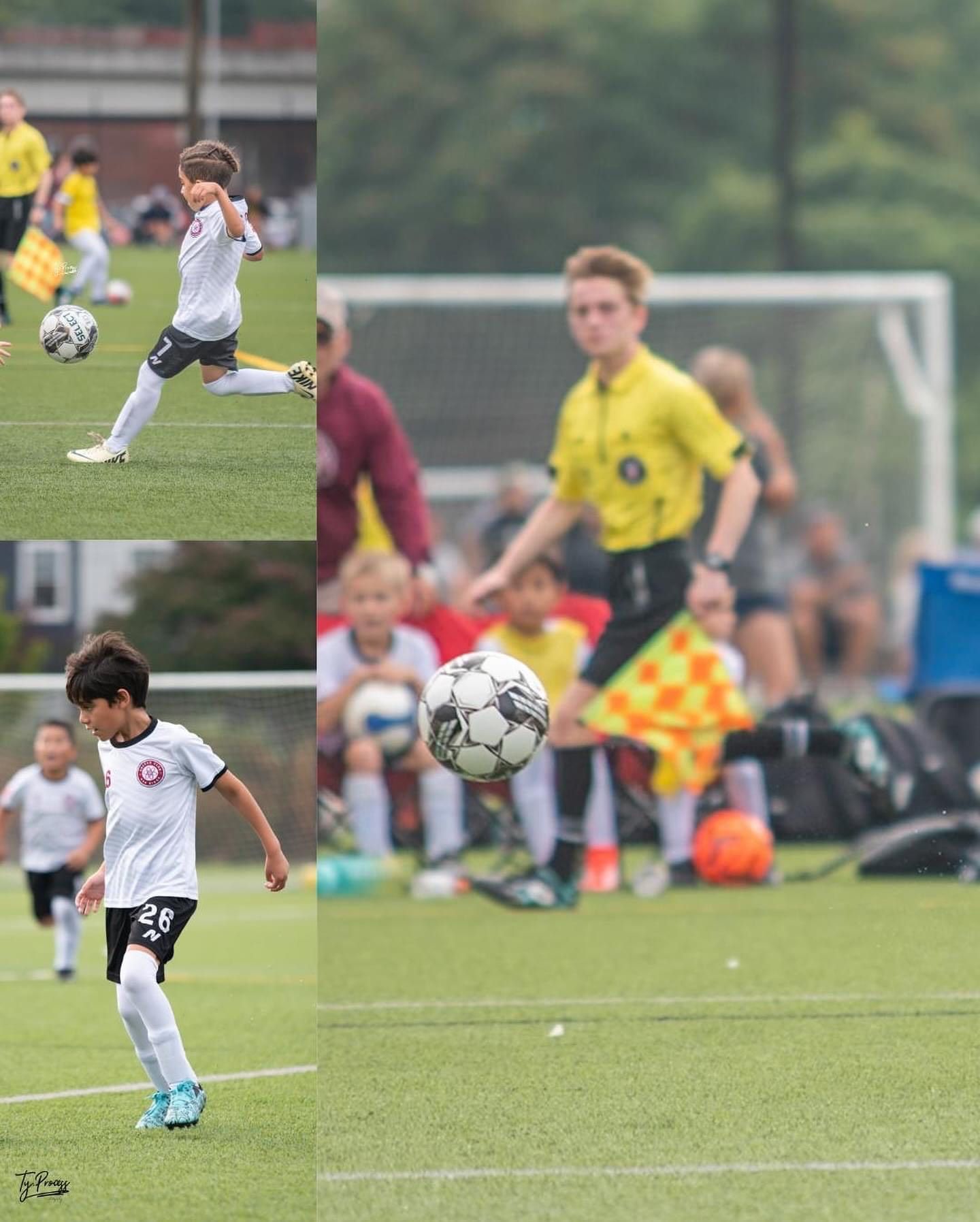 A young boy is kicking a soccer ball on a field