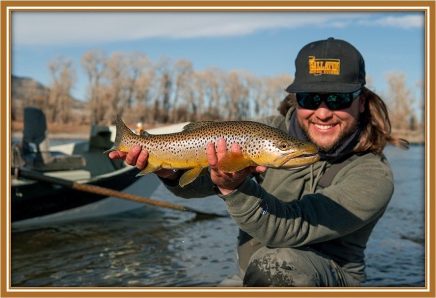 Fisherman Holding a Brown Trout