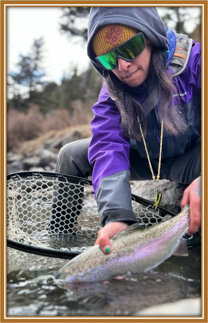 Woman Holding a Rainbow Trout