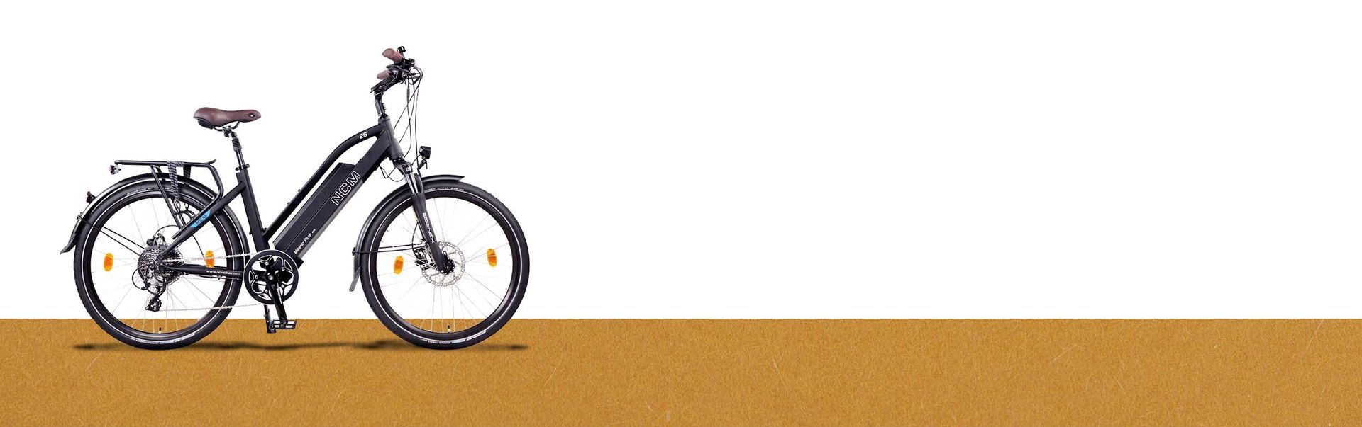 E-Bikes On Top Of A Brown Table — Goulburn Solar In Goulburn, NSW