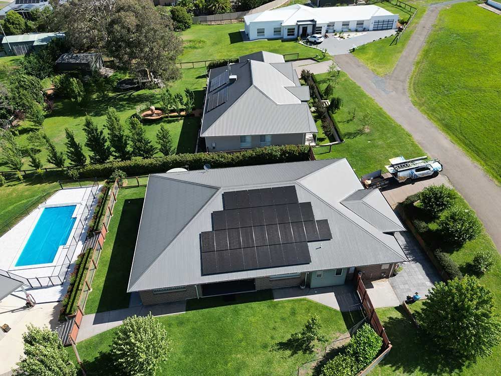 An Aerial View Of A House With Solar Panels On The Roof — Goulburn Solar In Goulburn, NSW