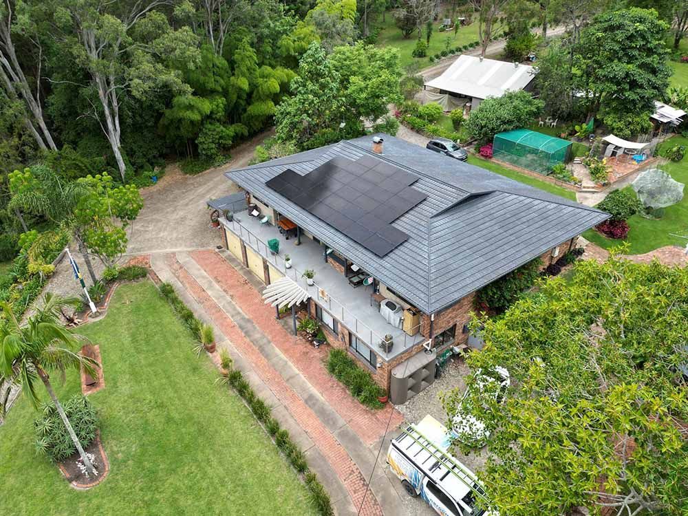 An Aerial View Of A House With Solar Panels On The Roof — Goulburn Solar In Goulburn, NSW