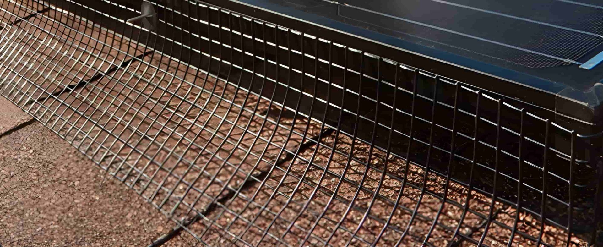A Close Up Image Of A Metal Mesh On A Roof Used For Bird Proofing — Goulburn Solar In Goulburn, NSW