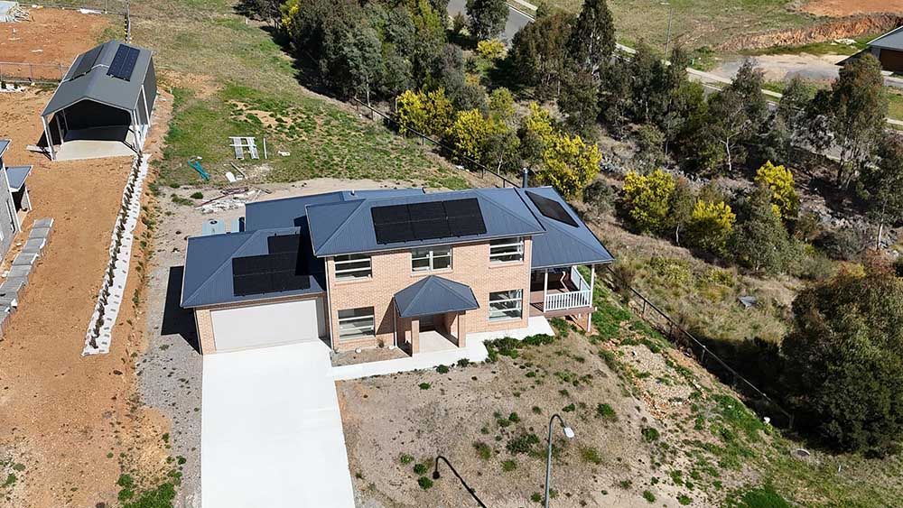 Aerial View Of A House With Solar Panels On The Roof — Goulburn Solar In Bowral, NSW