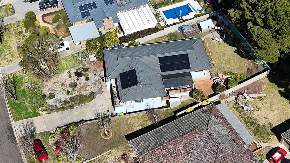 Aerial View Of A House With Solar Management System — Goulburn Solar In Bowral, NSW