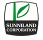 Sunniland Corporation logo: a green leaf and stem inside a black and white shield with the company name.