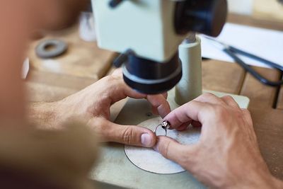 Jewelry Cleaning — Gemologist Inspecting the Ring in Reno, NV